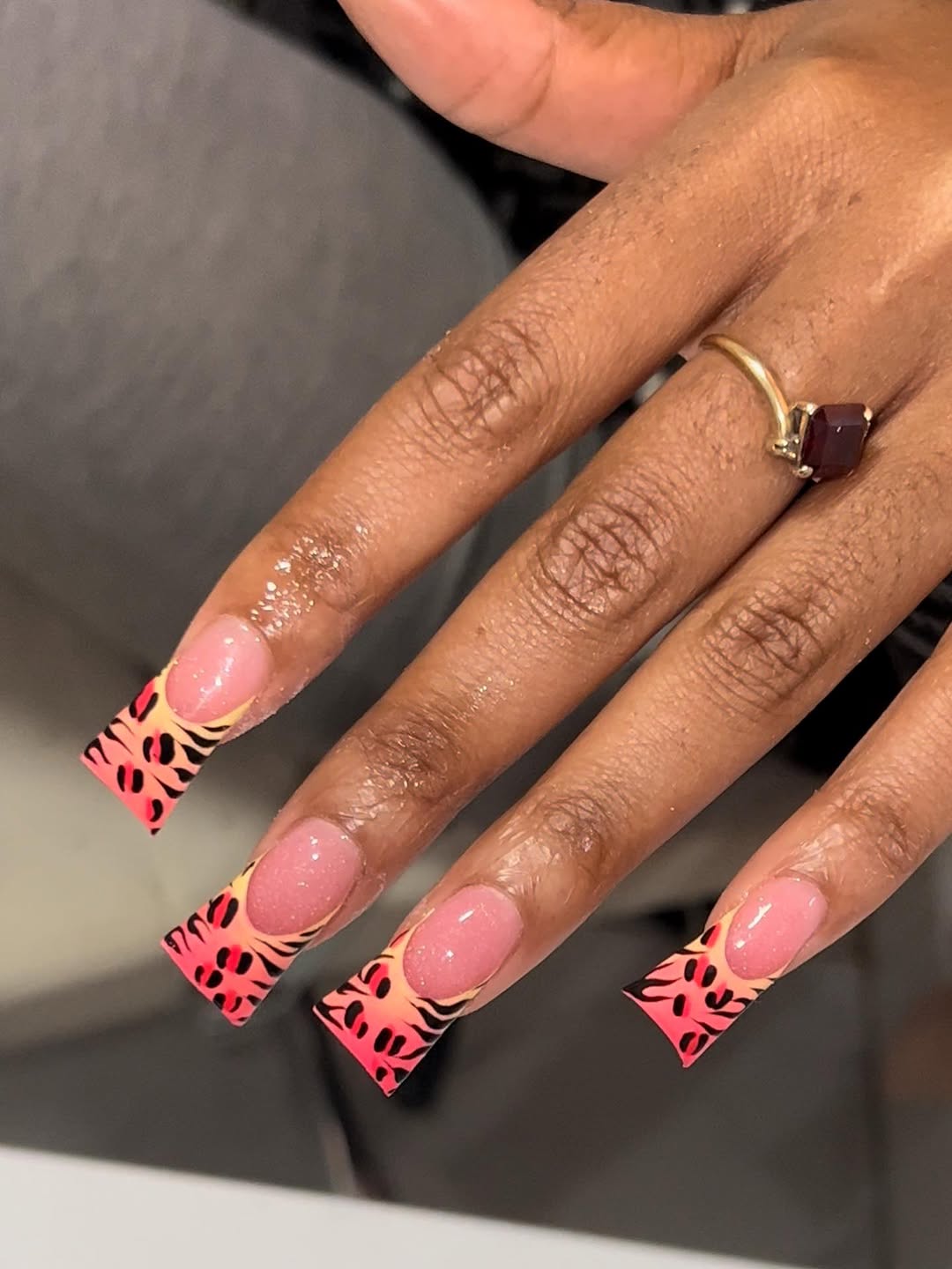Bold nail art with animal print design